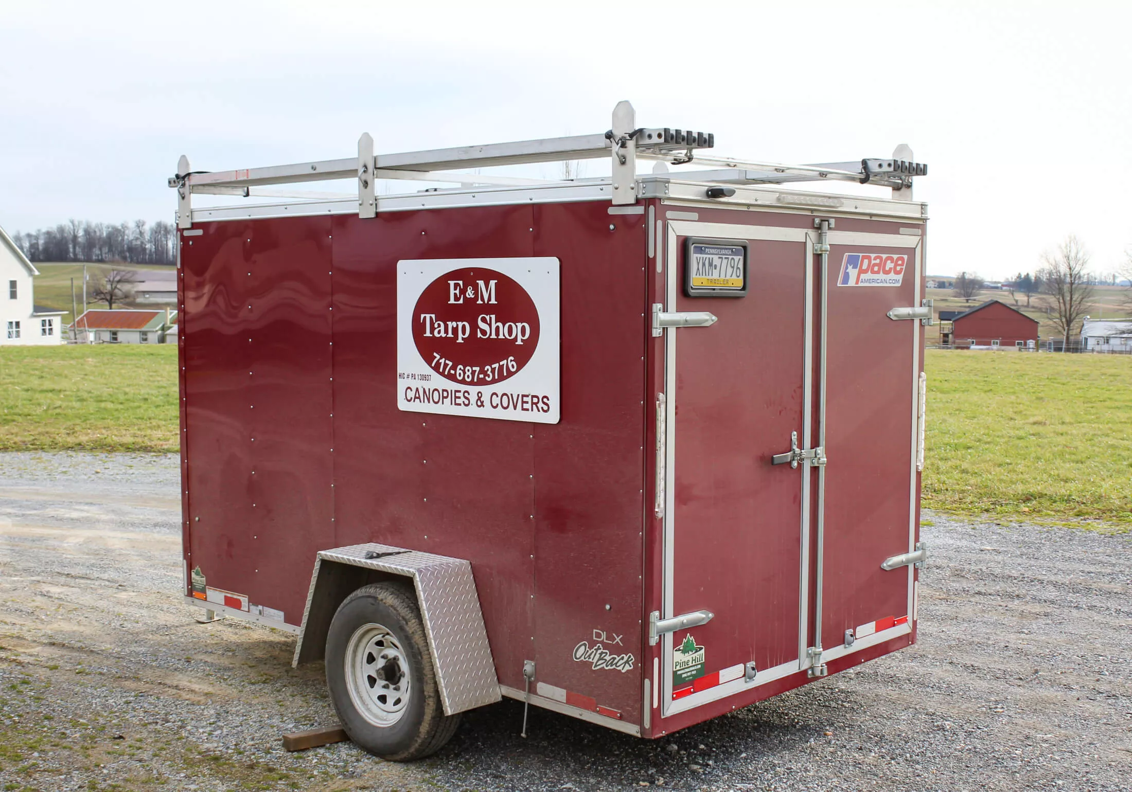 E & M Tarp Shop Just Plain Business