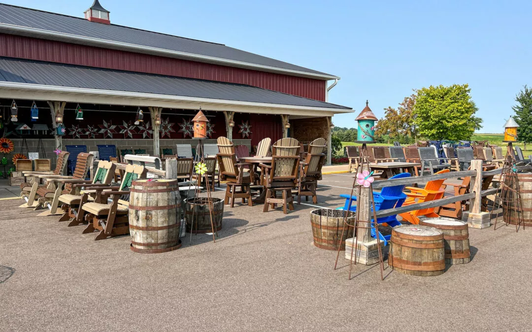 Weaver's Country Store Fall Creek, WI Outdoor Decorations and Poly Furniture on Display Outside of Country Store