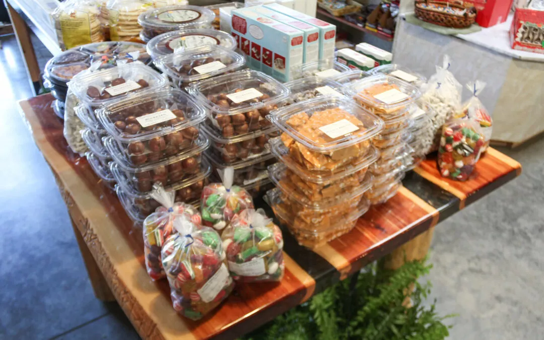 Cedar Grove Market and Bluegrass Hearth & Grill Cerulean KY Display Table of Candy at Grocery Store