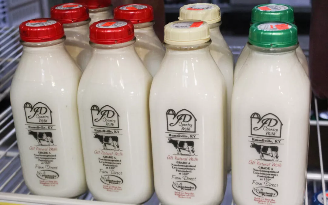 Cedar Grove Market and Bluegrass Hearth & Grill Cerulean KY Glass Bottles of JD Country Milk in Refrigerator at Grocery Store