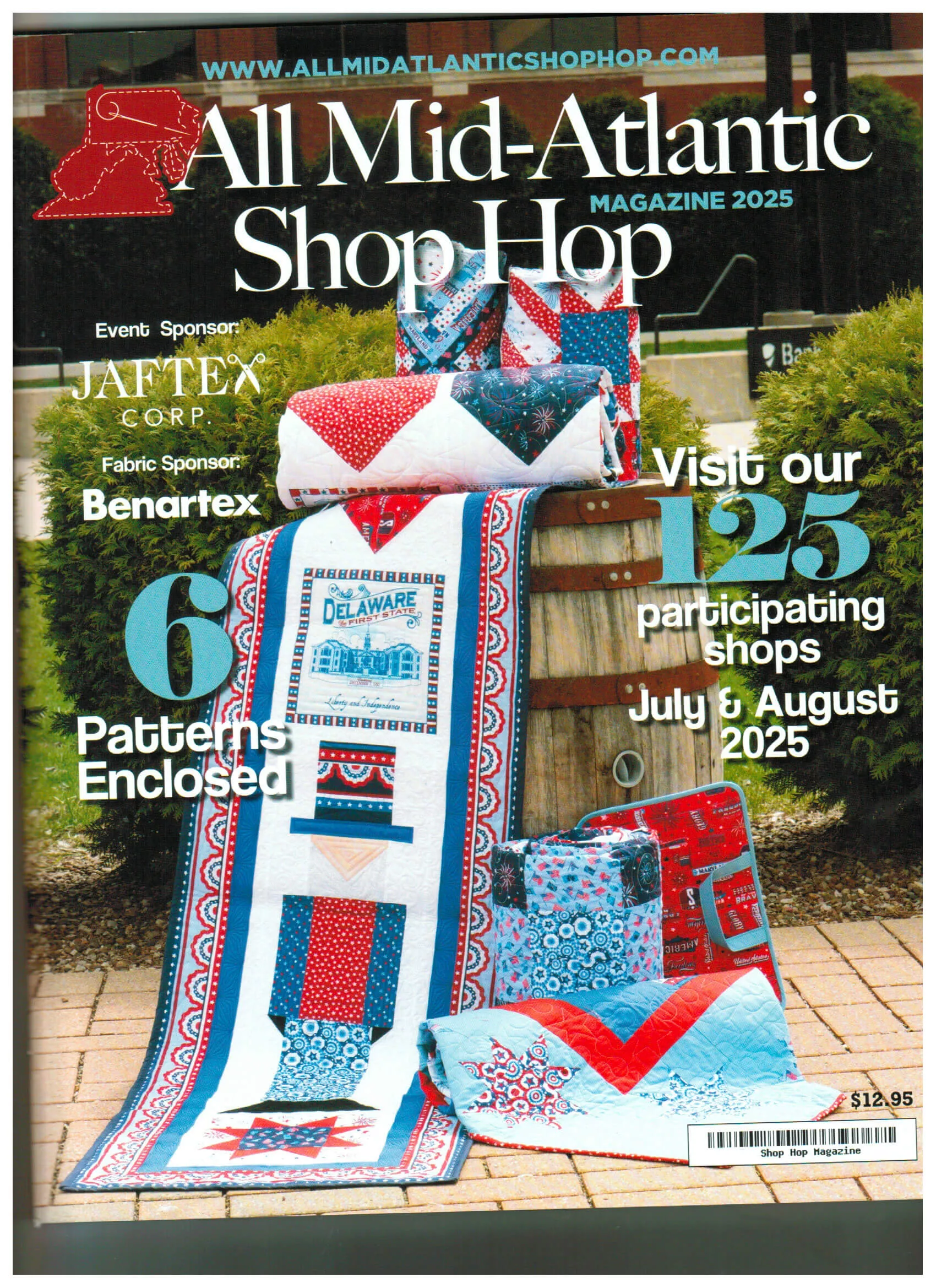 Quilts and pillows in red, white, and blue displayed on a wooden bench outdoors. Magazine cover text highlights event details and sponsors for the 2025 All Mid-Atlantic Shop Hop.
