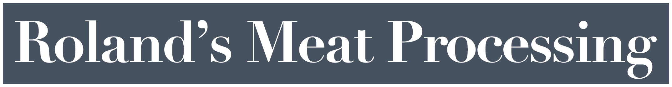A rectangular sign with the text "Roland’s Meat Processing" in large white letters on a dark gray background.