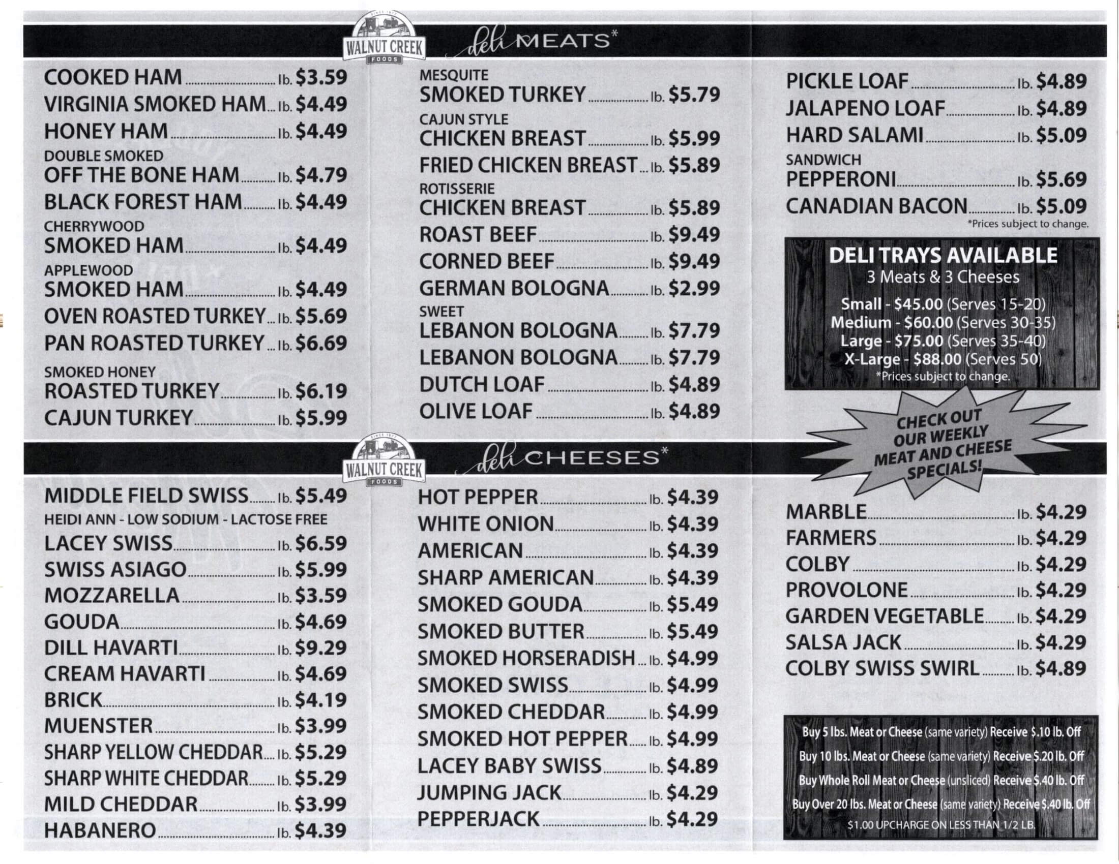 Black-and-white deli menu listing prices for various meats and cheeses, including ham, turkey, salami, and cheddar, with a section for deli tray options.