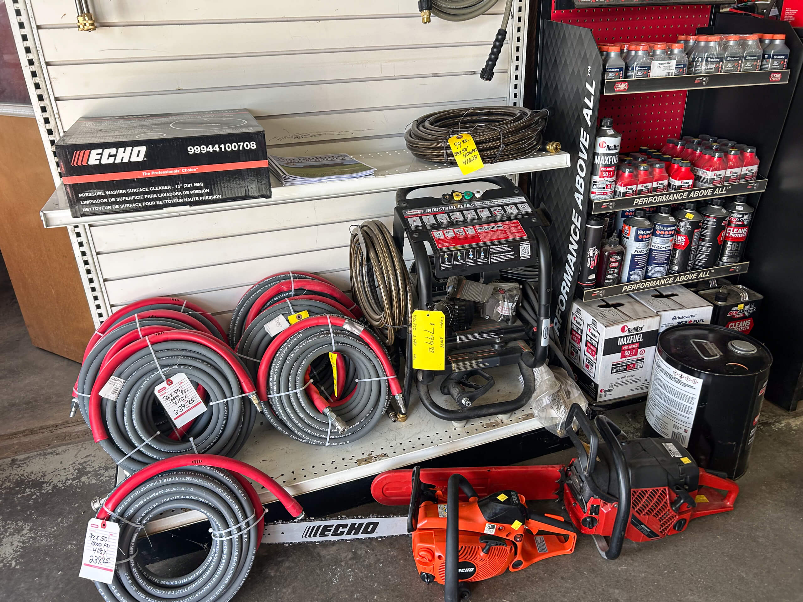 AK Small Engines Versailles, MO chain saws, fuel oil in cans and pressure washer surface cleaner