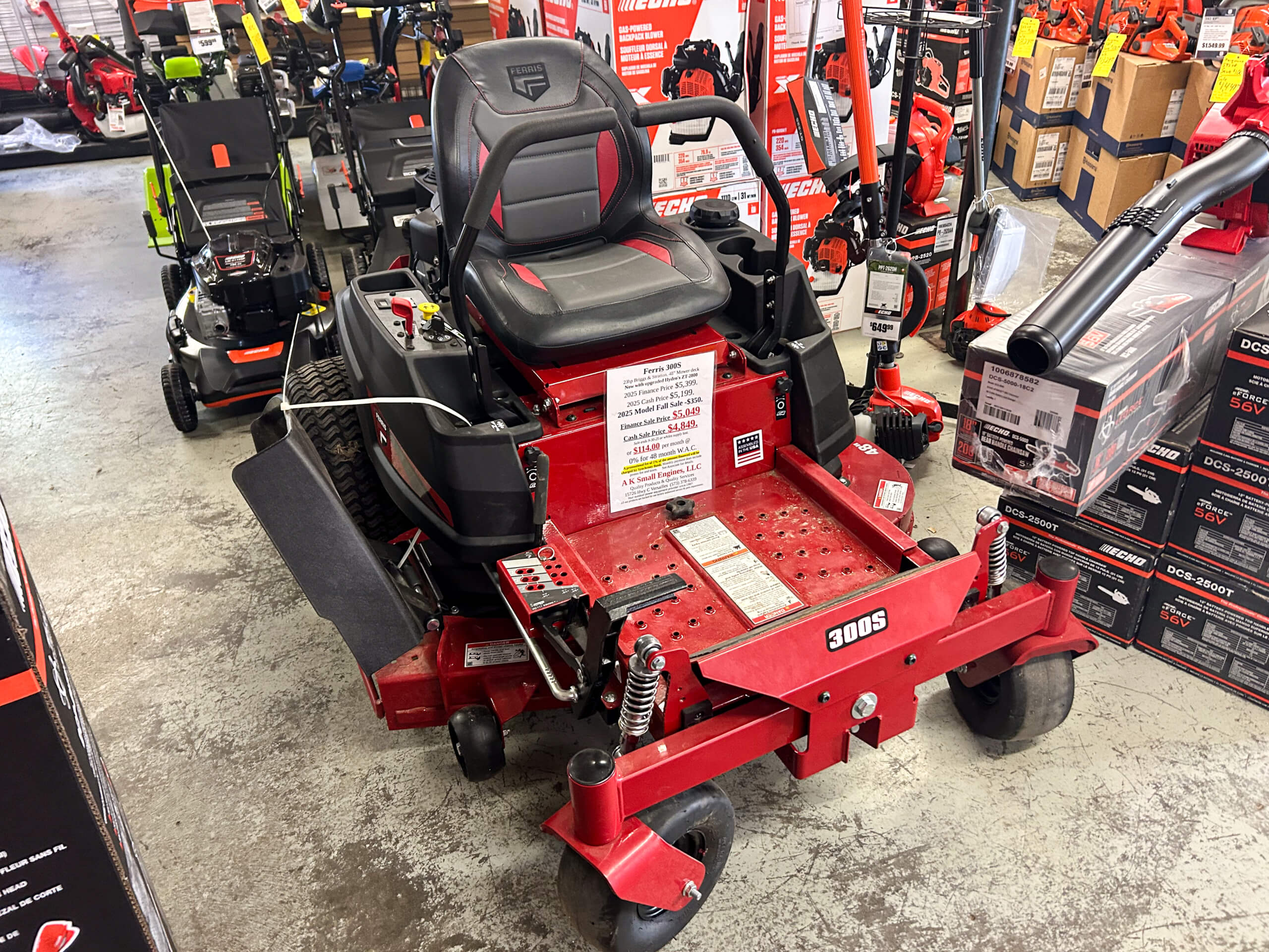 11.4.25 AK Small Engines Gallery 2-7 a red 300s ferris lawn mower and several outdoor yard tools