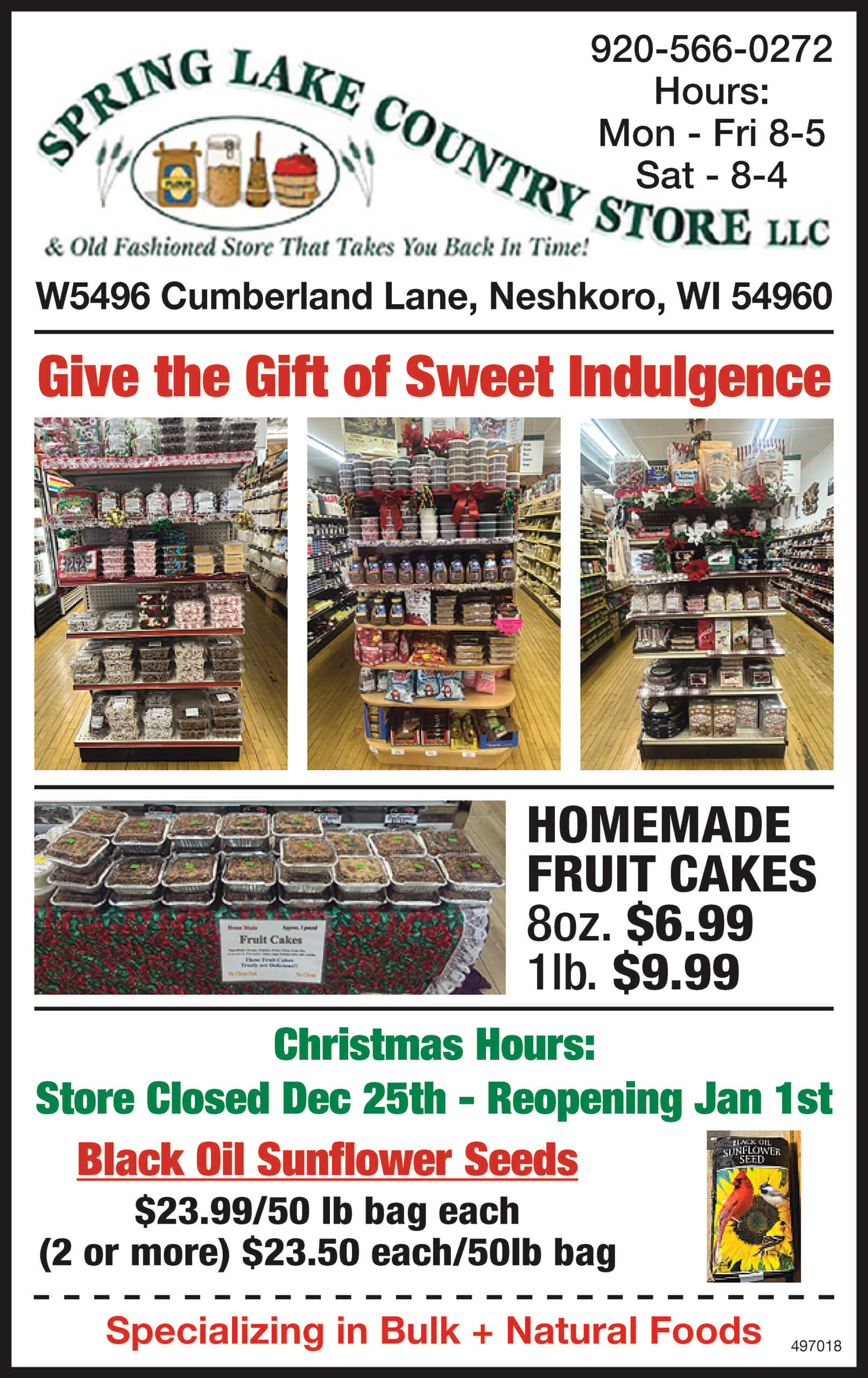 Display of candy shelves at Spring Lake Country Store with store hours, address, holiday hours, and product specials for fruit cakes and black oil sunflower seeds.